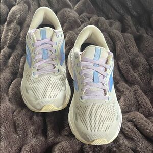 Stylish Cream and Purple Sneakers made by Brooks